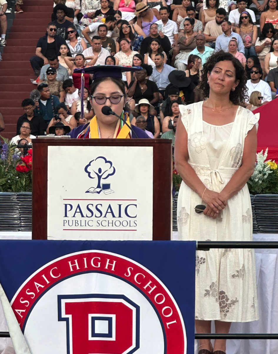 Prep Valedictorian Francesca Penaloza, left, and Principal Bruce at Graduation 2025, Boverini Stadium, June 25, 2025.